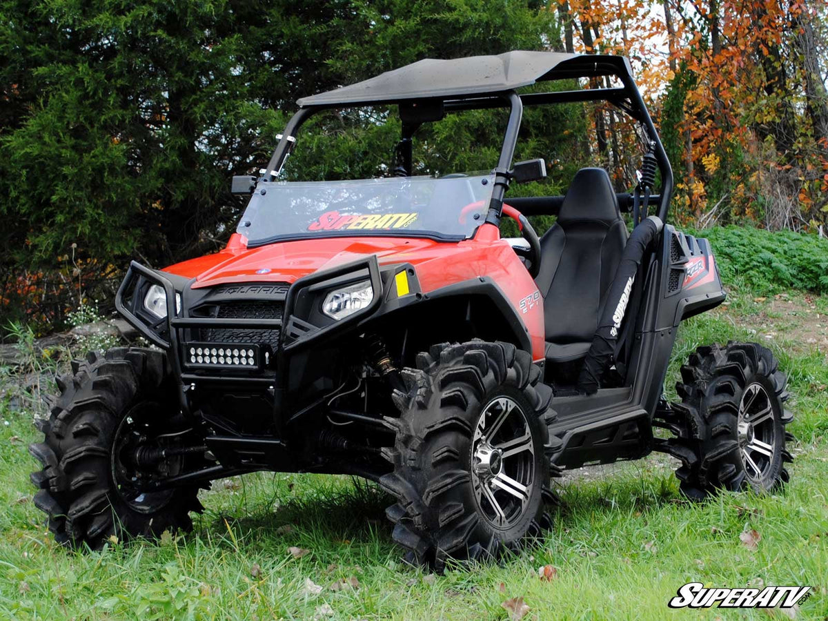 SuperATV Polaris RZR rock sliding nerf bars – installed side view